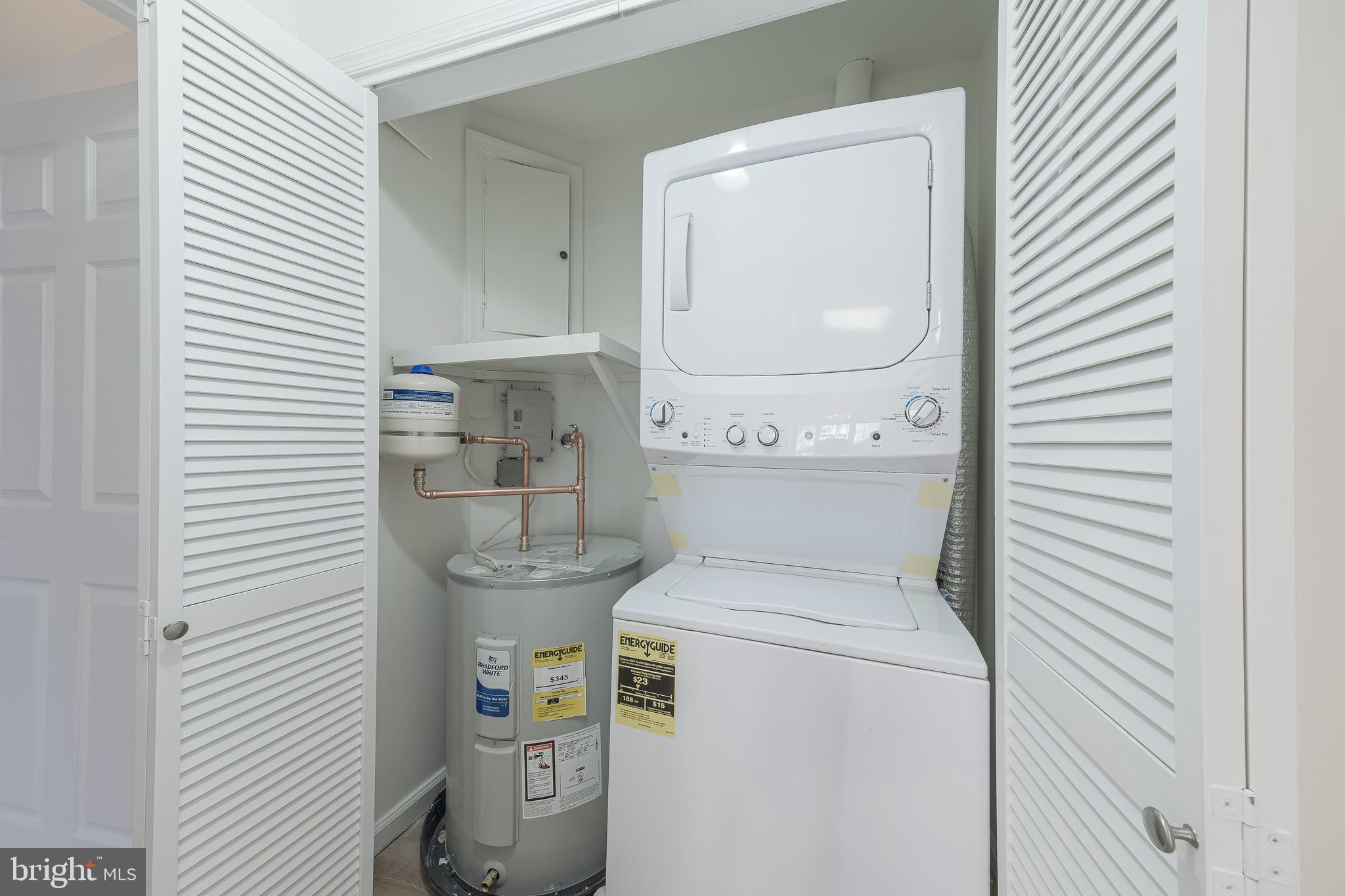 1427 Church Hill Place Reston, VA 20194 - Photo 21 of 30 a utility room with dryer and washer