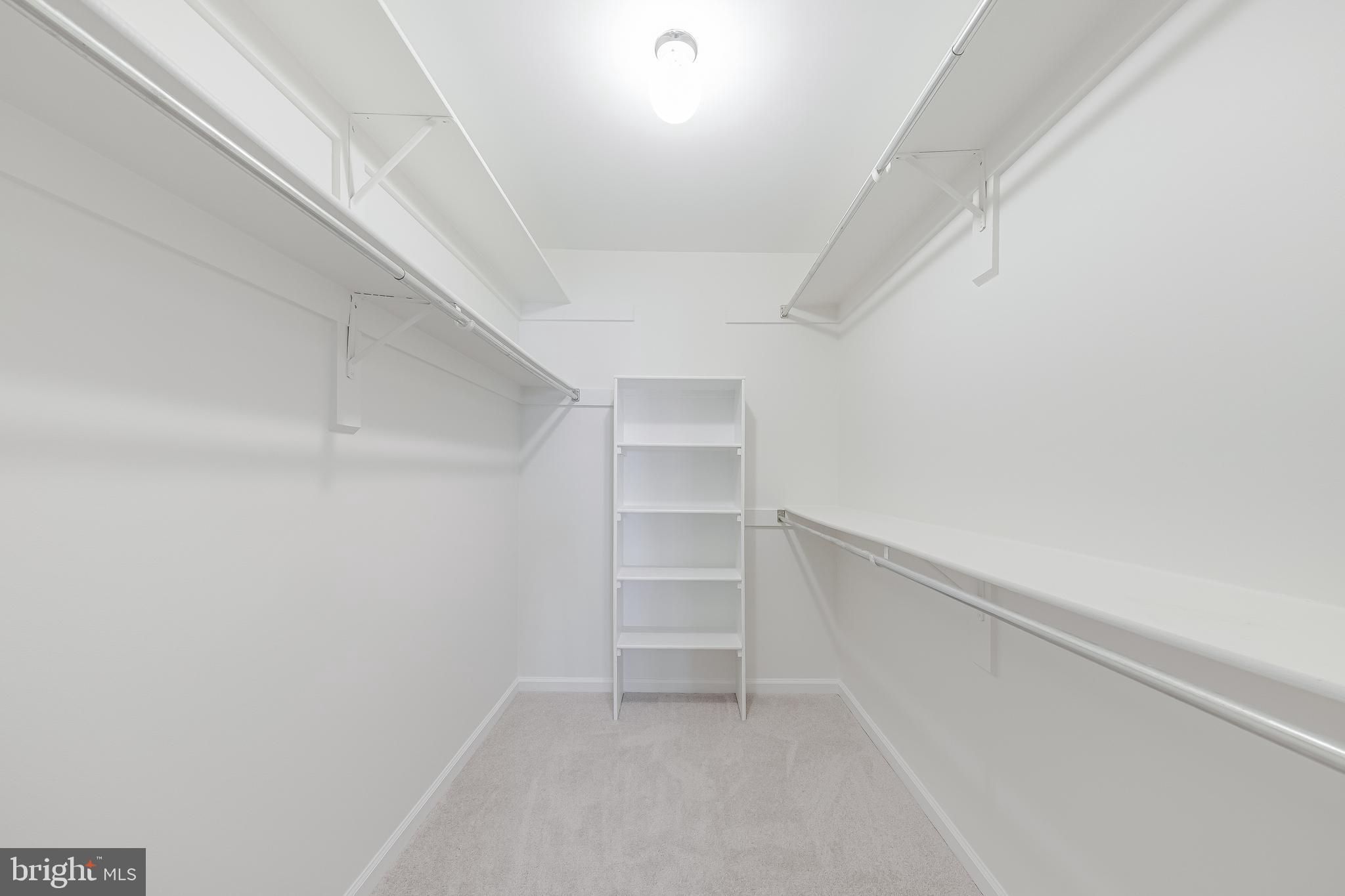 1427 Church Hill Place Reston, VA 20194 - Photo 26 of 30 a view of an empty walk in closet