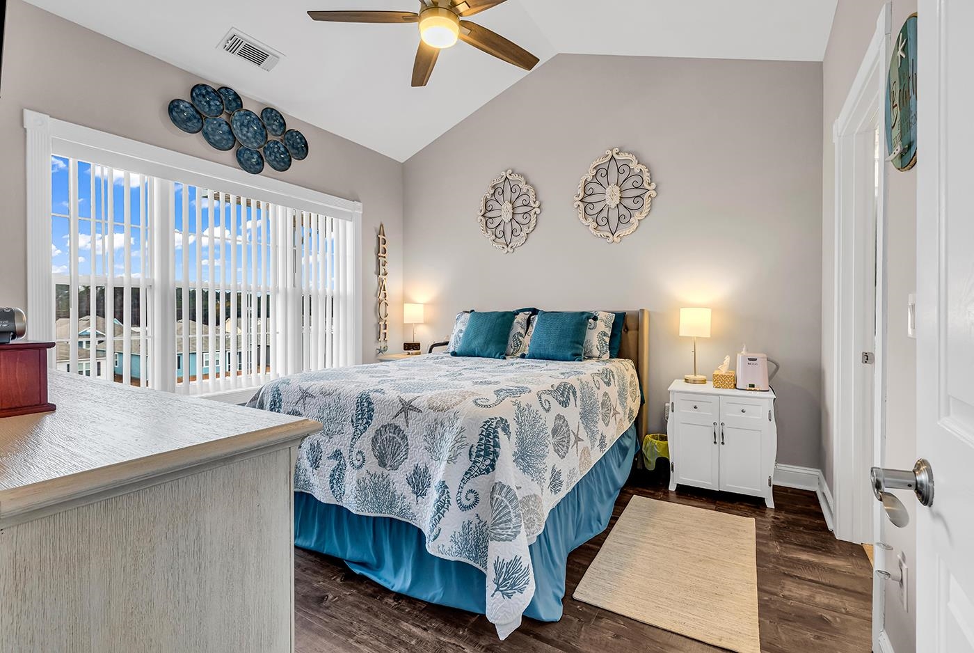 124 South Shore Boulevard, Unit 301 Longs, SC 29568 - Photo 17 of 27 Bedroom featuring lofted ceiling, ceiling fan, and dark wood-style flooring