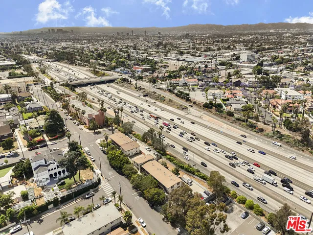 an aerial view of residential building and green space