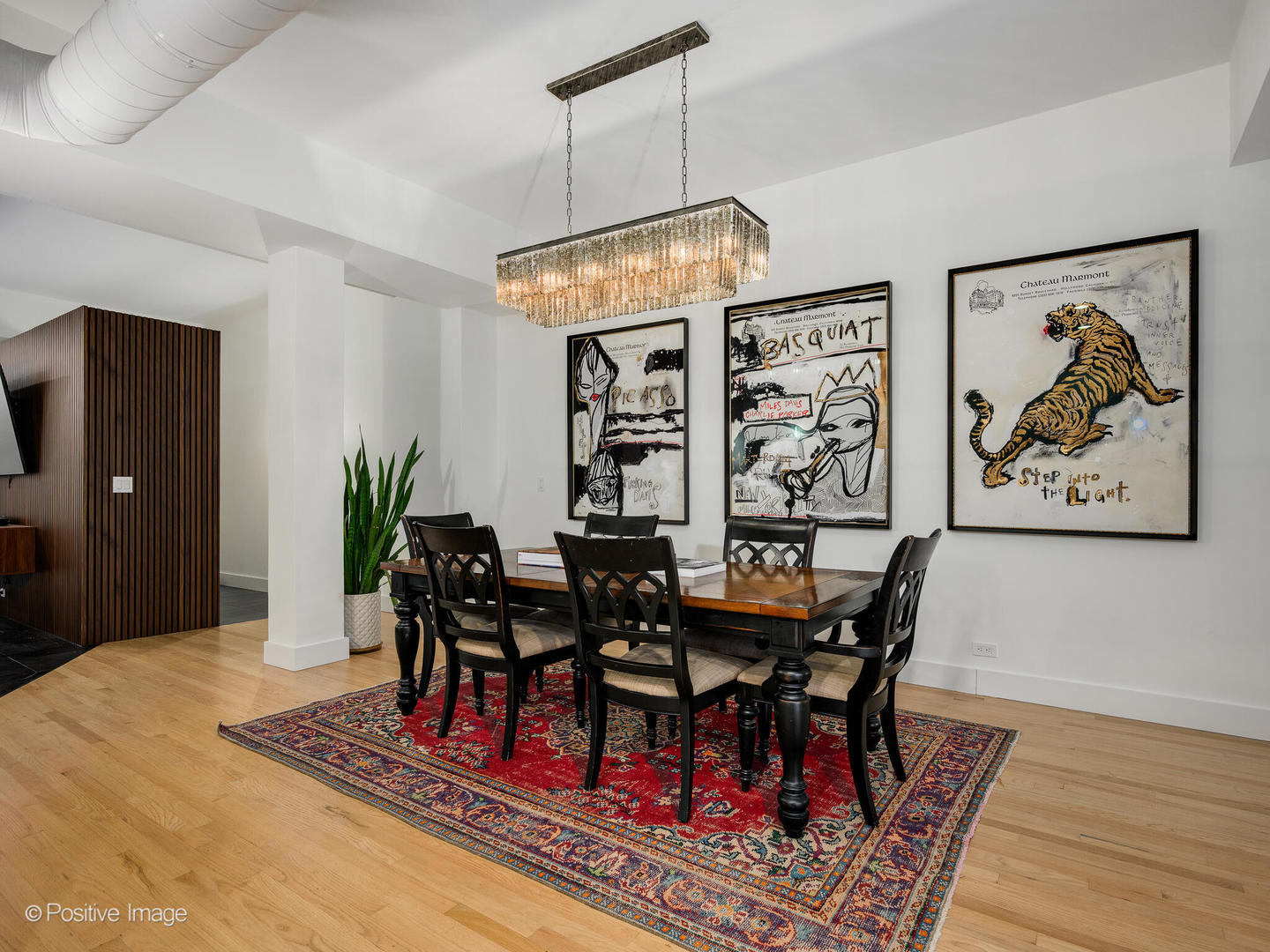 1760 West Wrightwood Avenue, Unit 204 Chicago, IL 60614 - Photo 14 of 28 a view of a dining room with furniture and chandelier