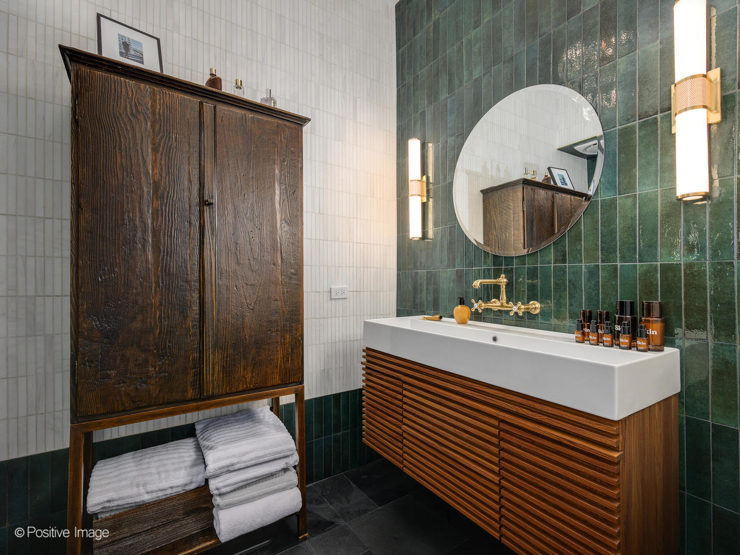 1760 West Wrightwood Avenue, Unit 204 Chicago, IL 60614 - Photo 19 of 28 a bathroom with a sink and a mirror