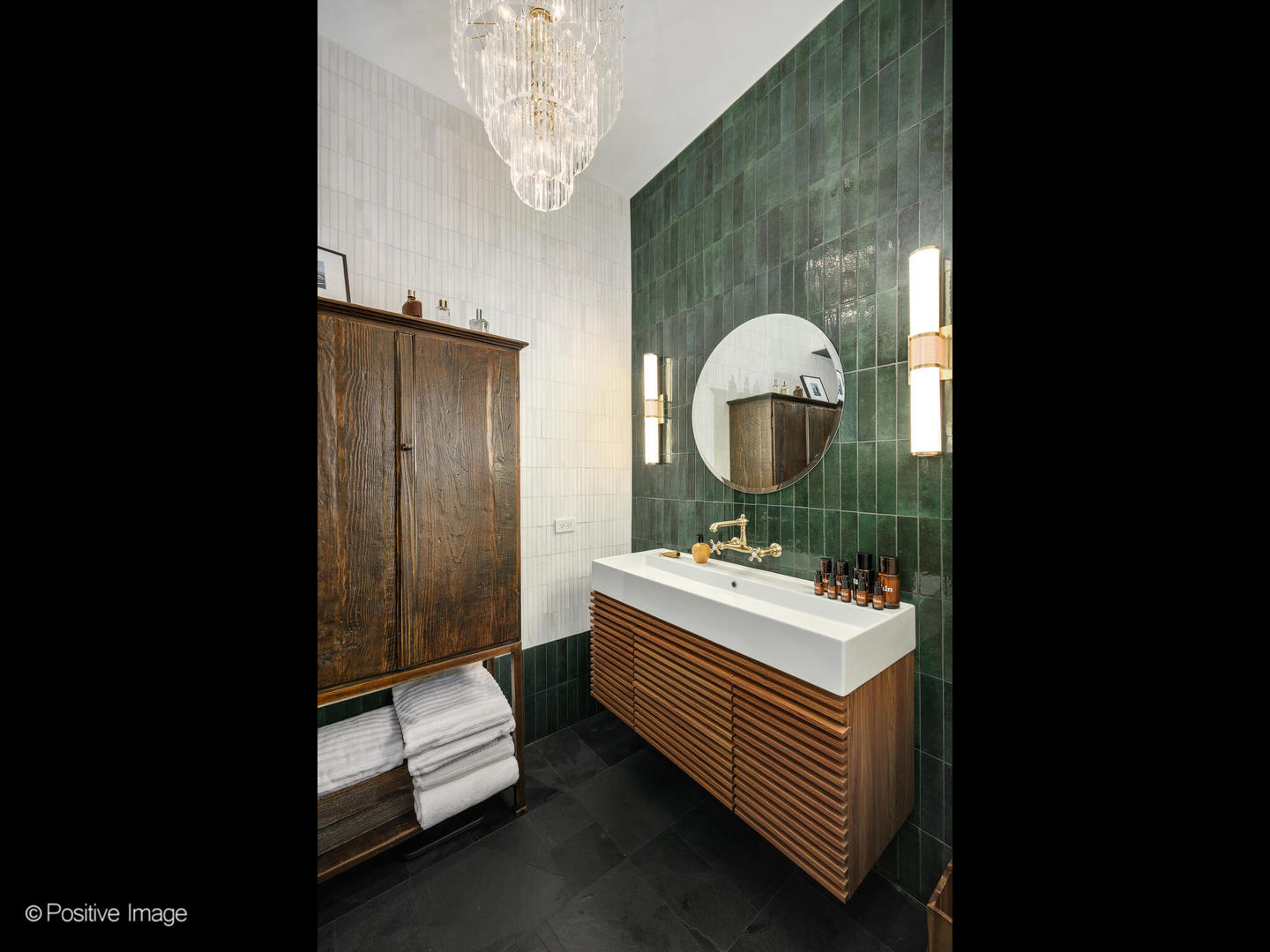 1760 West Wrightwood Avenue, Unit 204 Chicago, IL 60614 - Photo 20 of 28 a room with a sink wooden floor and chandelier