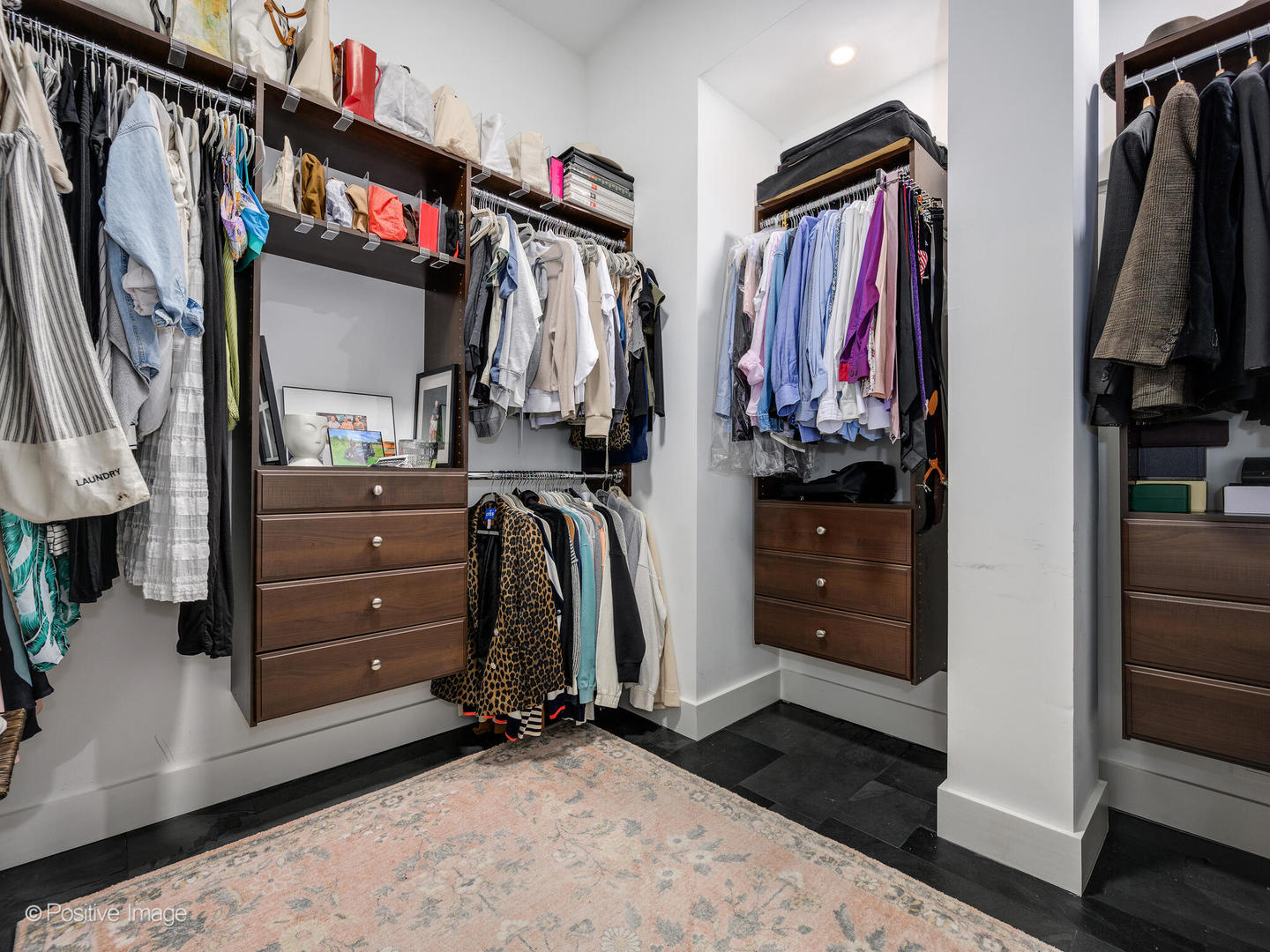 1760 West Wrightwood Avenue, Unit 204 Chicago, IL 60614 - Photo 23 of 28 a view of walk in closet with clothes and shoes