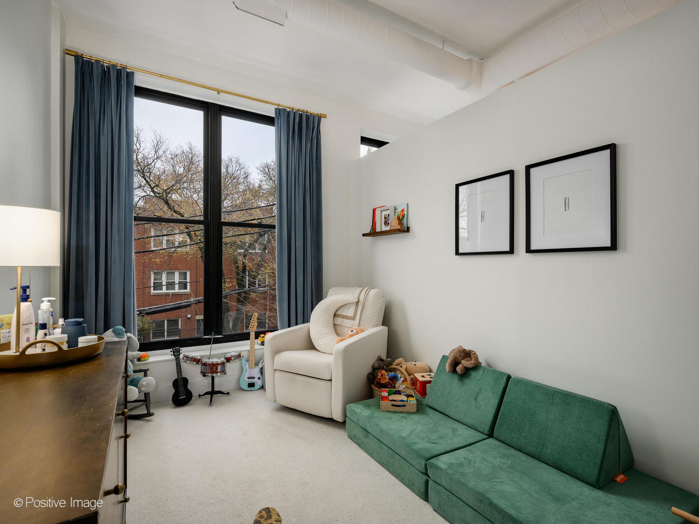 1760 West Wrightwood Avenue, Unit 204 Chicago, IL 60614 - Photo 24 of 28 a living room with furniture and a large window