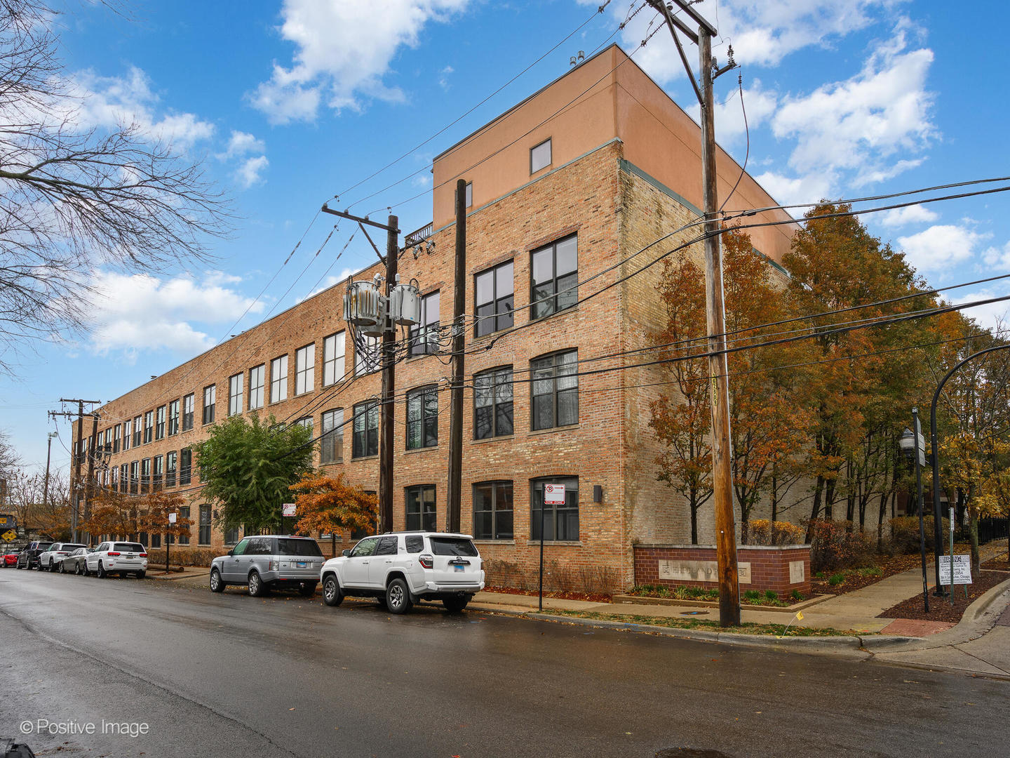 1760 West Wrightwood Avenue, Unit 204 Chicago, IL 60614 - Photo 27 of 28 a view of a parked cars in front of a building