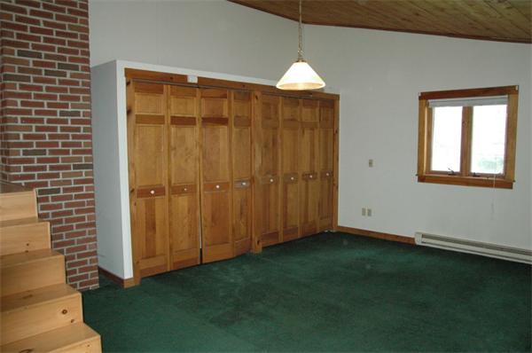 81 Intervale Road Orange, MA 01364 - Photo 9 of 13 a view of an empty room with window and gate