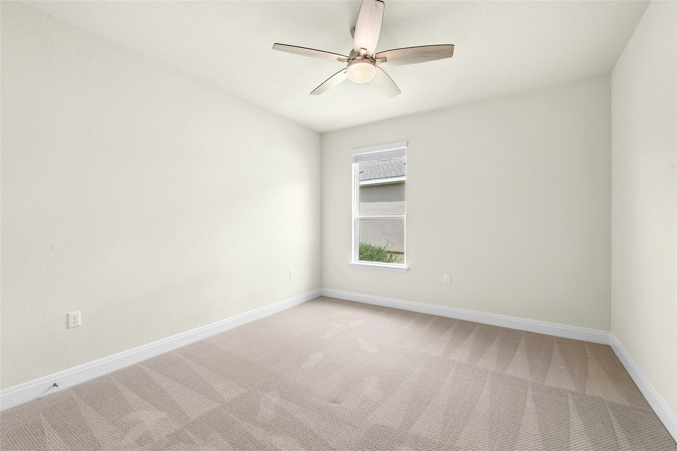 105 Marfa Cove Georgetown, TX 78633 - Photo 25 of 36 an empty room with a empty space and a ceiling fan