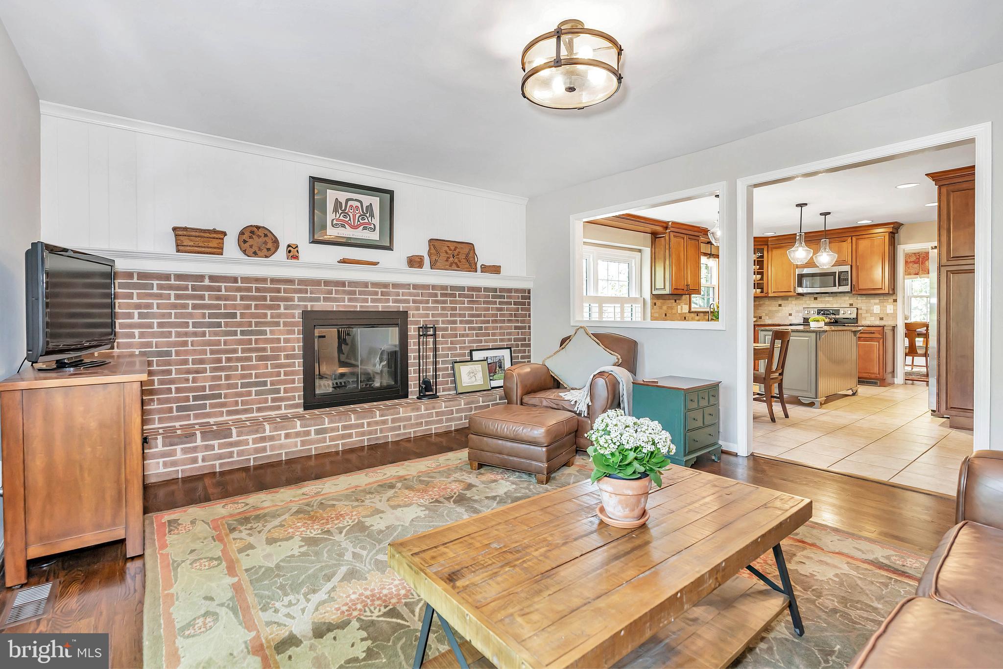 4 Kenwick Road Hockessin, DE 19707 - Photo 14 of 44 Family room with wood burning fireplace