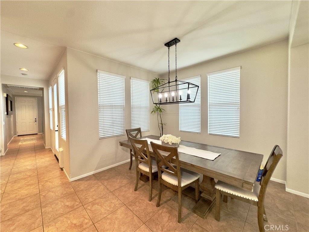 11265 Runyan Road Beaumont, CA 92223 - Photo 33 of 138 a view of a dining room with furniture window and outside view