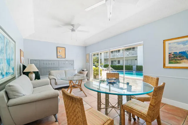 a living room with furniture and a table