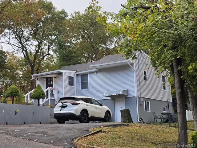 a house view with a backyard space