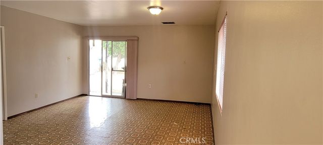 a view of a yard with an outdoor space