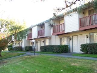 1009 Golf Course Drive Rohnert Park, CA 94928 - Photo 1 of 1 a front view of a house with garden