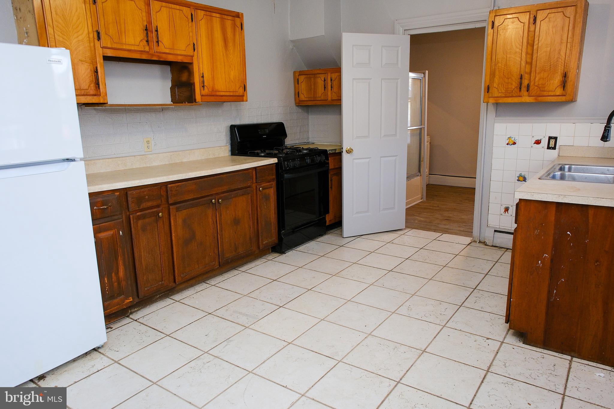 225 Front Street York, PA 17404 - Photo 16 of 42 a kitchen with a cabinets and appliances