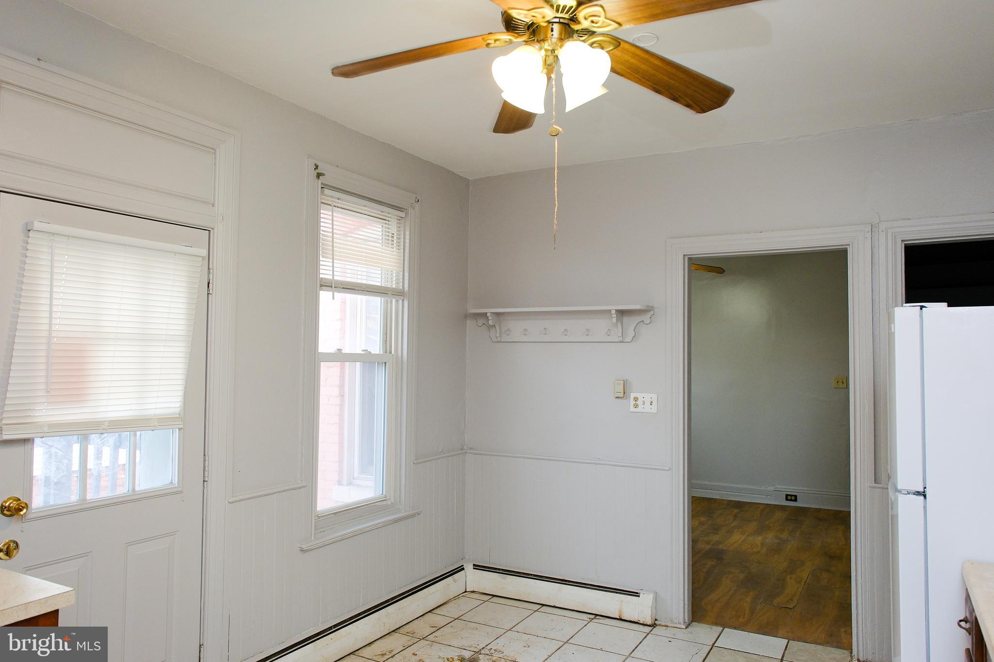 225 Front Street York, PA 17404 - Photo 18 of 42 a view of an empty room with a window