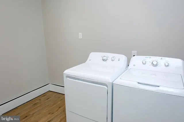 a utility room with dryer and washer