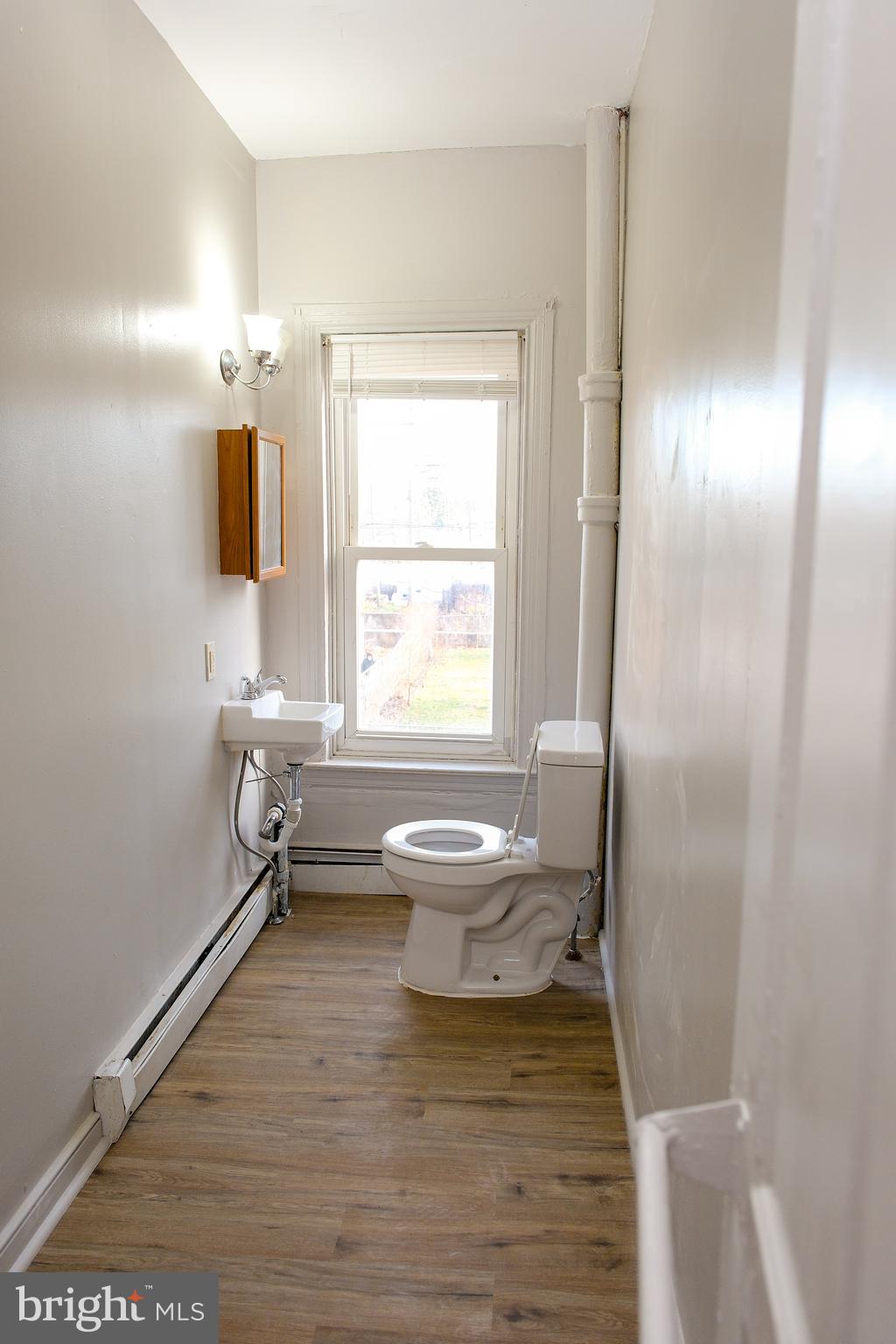 225 Front Street York, PA 17404 - Photo 27 of 42 a bathroom with a sink and a mirror