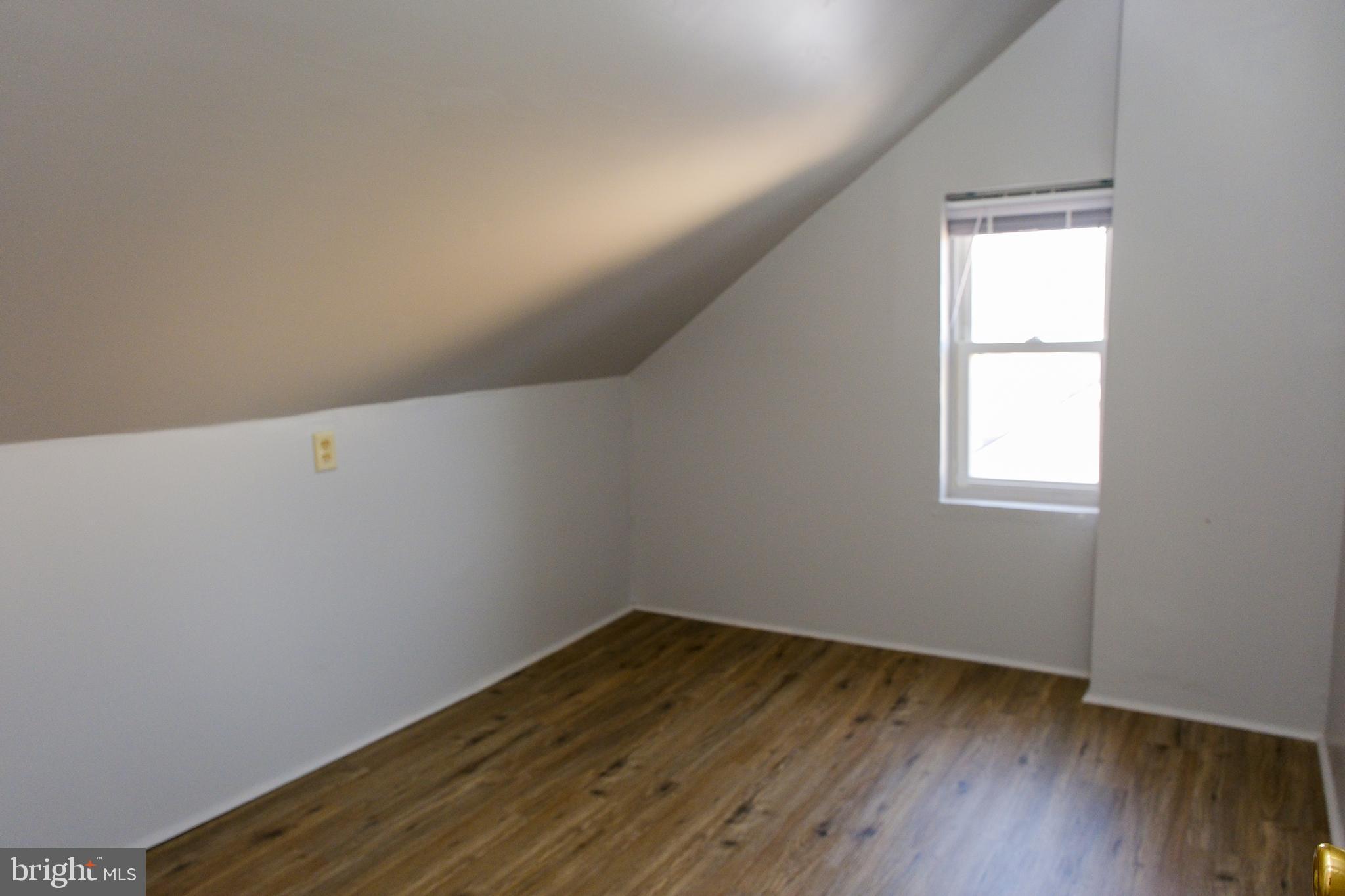 225 Front Street York, PA 17404 - Photo 34 of 42 a view of a room with wooden floor and window