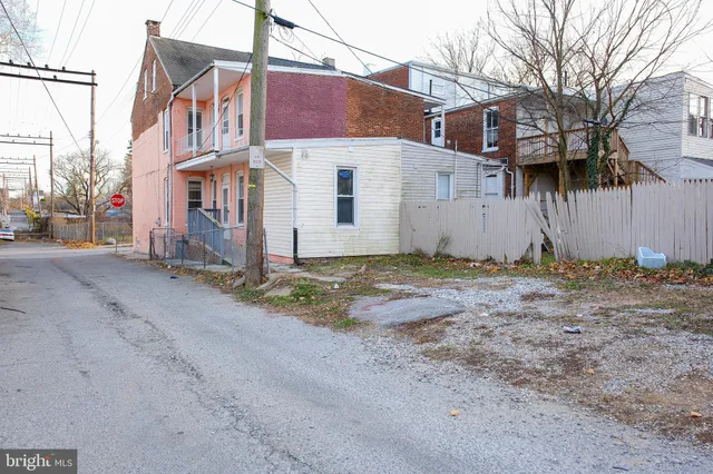 a view of a house with a street