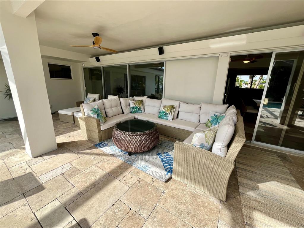 556 Southeast 15th Avenue Deerfield Beach, FL 33441 - Photo 11 of 42 a living room with furniture and a flat screen tv