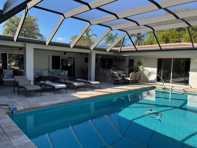a view of yard with patio