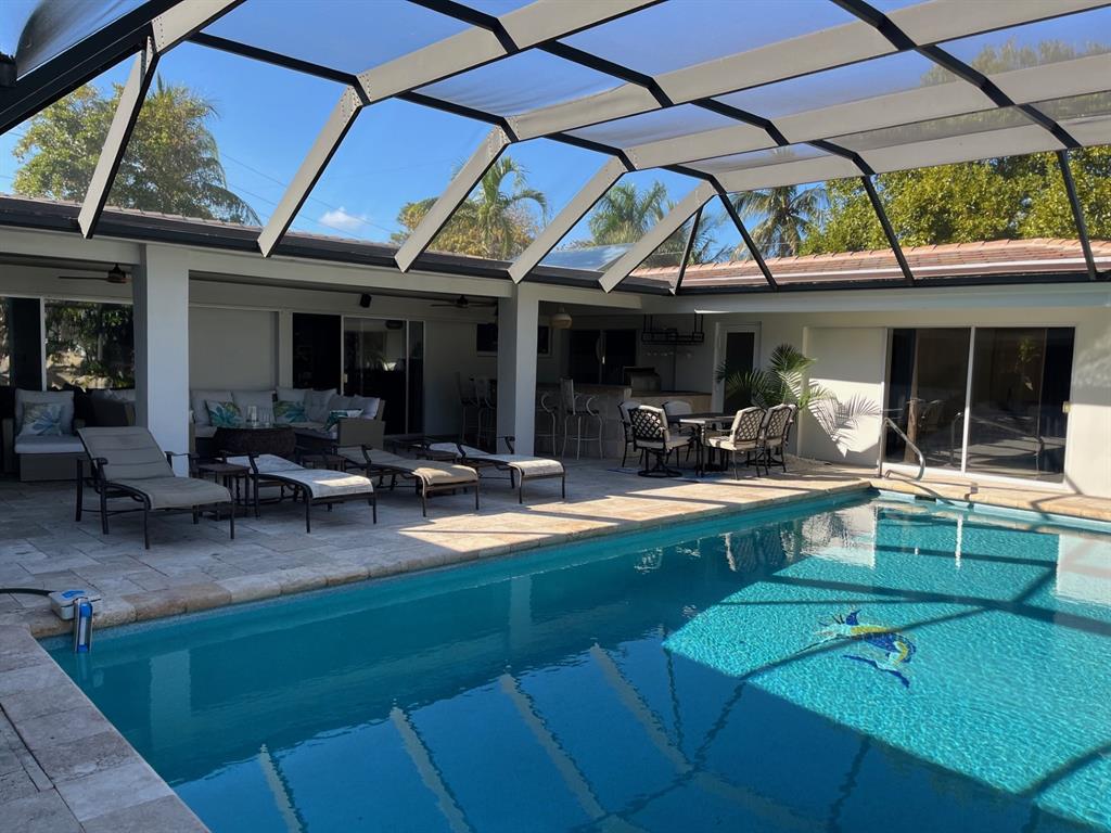 556 Southeast 15th Avenue Deerfield Beach, FL 33441 - Photo 5 of 42 a view of a swimming pool with sitting area