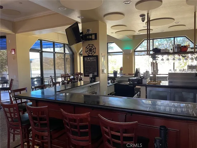 a kitchen with a table and chairs