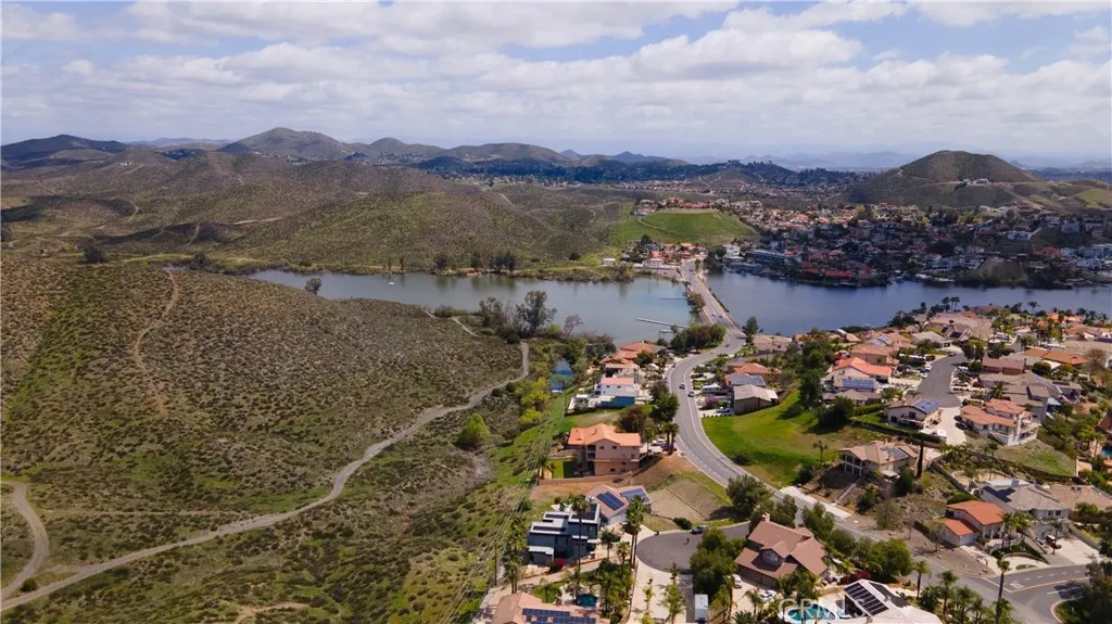 29046 Scout Canyon Lake Canyon Lake, CA 92587 - Photo 18 of 40 a view of a lake with a mountain