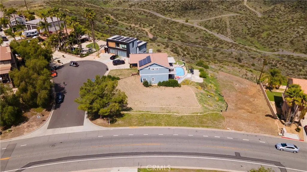 29046 Scout Canyon Lake Canyon Lake, CA 92587 - Photo 2 of 40 an aerial view of residential houses with yard
