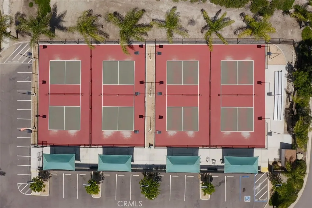 29046 Scout Canyon Lake Canyon Lake, CA 92587 - Photo 31 of 40 an aerial view of a house with a yard and large tree