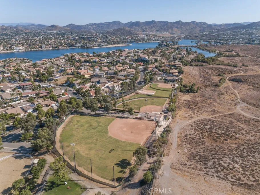 29046 Scout Canyon Lake Canyon Lake, CA 92587 - Photo 36 of 40 an aerial view of a house with a lake view