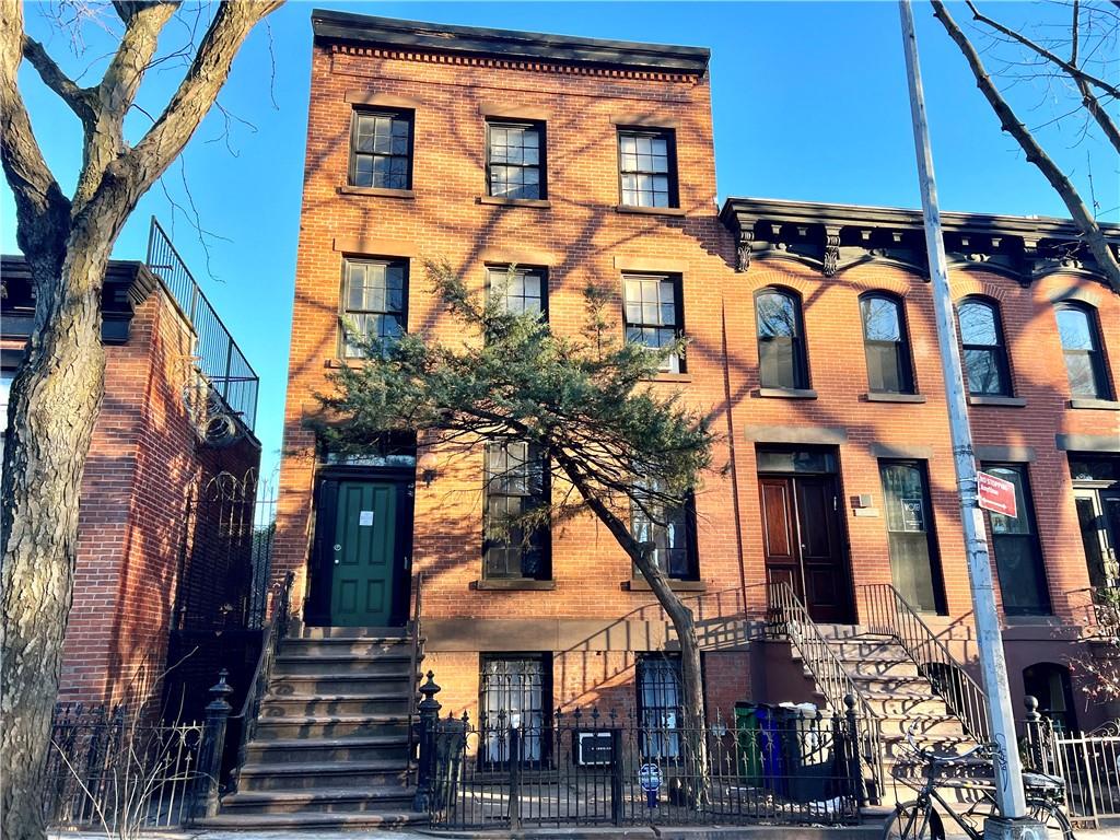 159 Bond Street Brooklyn, NY 11217 - Photo 1 of 20 a view of a building with a tree