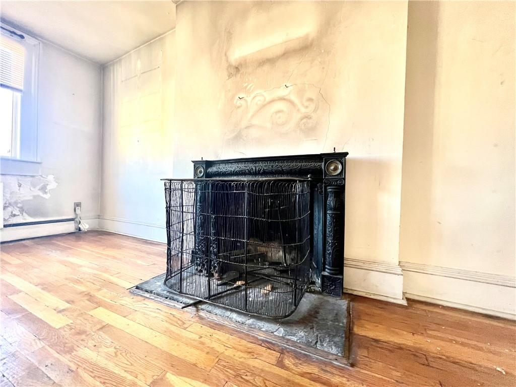 159 Bond Street Brooklyn, NY 11217 - Photo 14 of 20 a living room with furniture a flat screen tv and a window