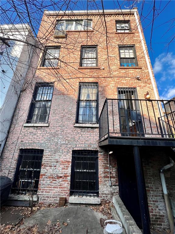 159 Bond Street Brooklyn, NY 11217 - Photo 5 of 20 a building with a clock on the top