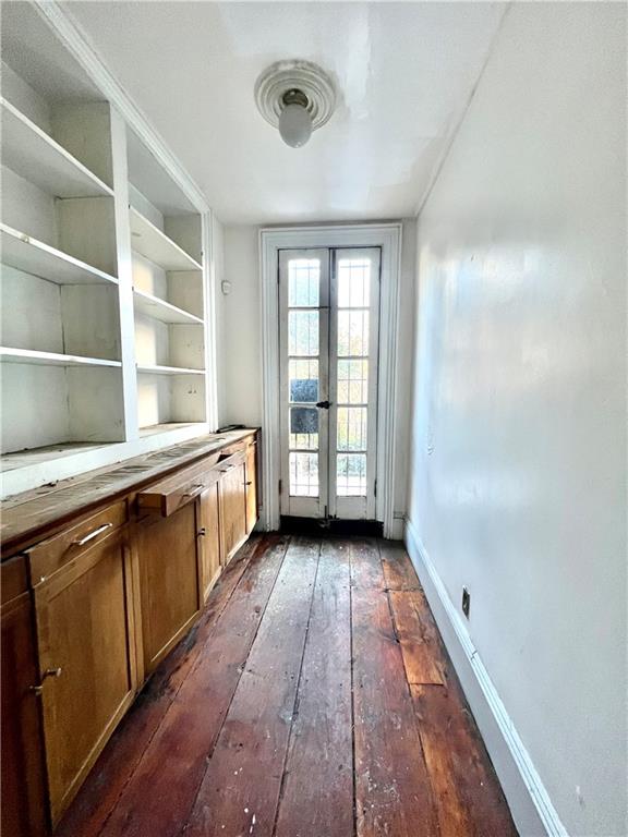 159 Bond Street Brooklyn, NY 11217 - Photo 10 of 20 a large kitchen with a wooden floor and a window