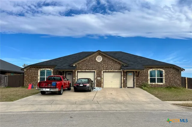 a car parked in front of a house