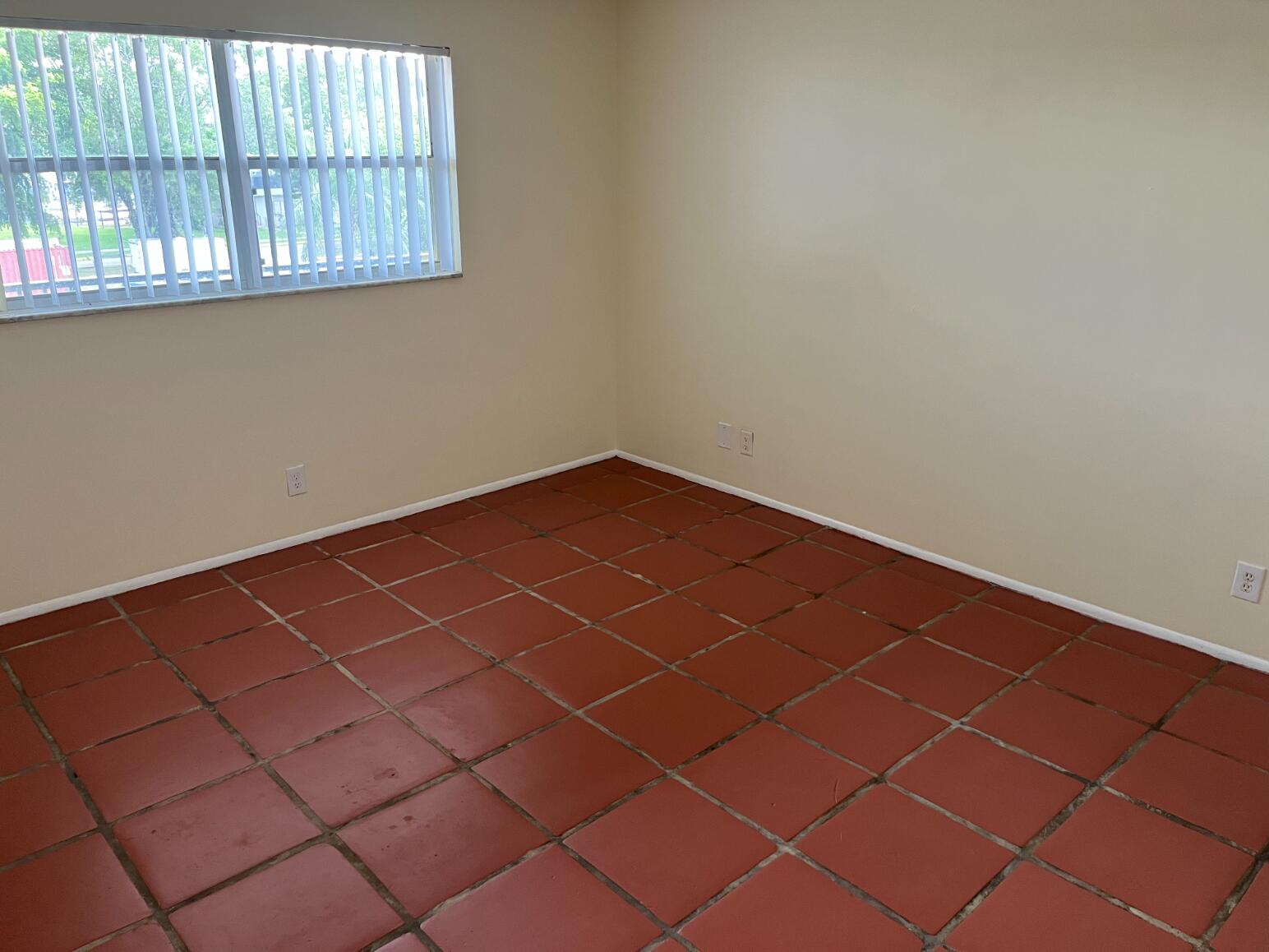 7911 North Colony Circle, Unit 305 Tamarac, FL 33321 - Photo 17 of 42 a view of a room with windows