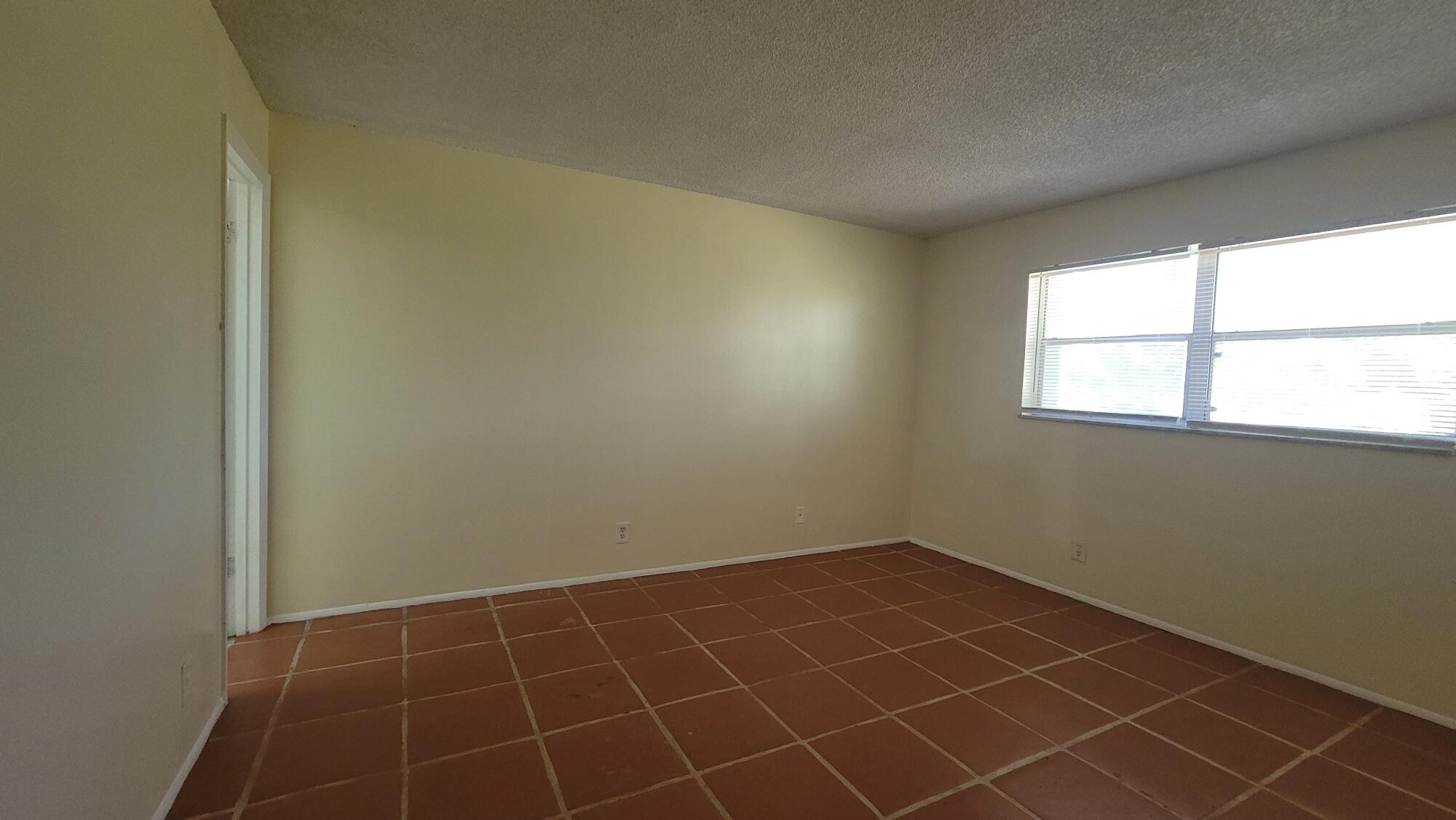 7911 North Colony Circle, Unit 305 Tamarac, FL 33321 - Photo 19 of 42 a view of a room that has a window in it