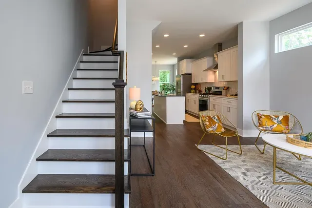 a view of a car parked in front of a building