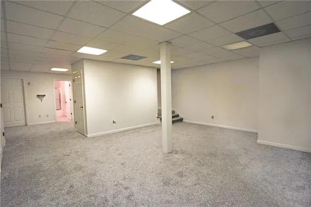 an empty room with a workbench