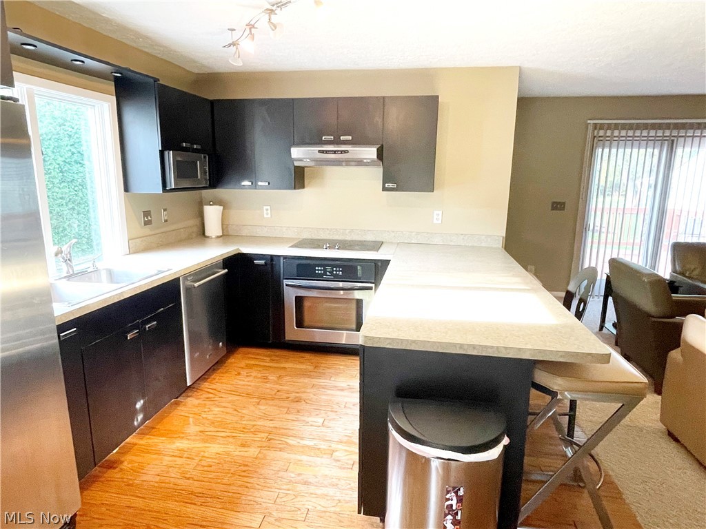 5528 Huron Road Lyndhurst, OH 44124 - Photo 7 of 26 Remodeled Kitchen w/ breakfast bar