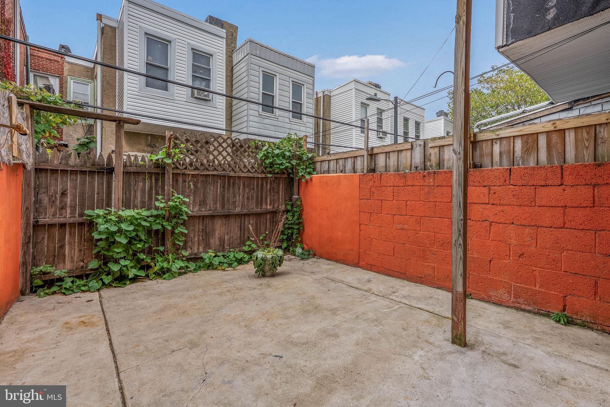 2951 Gerritt Street Philadelphia, PA 19146 - Photo 11 of 21 a view of a brick house with a bench in front of it