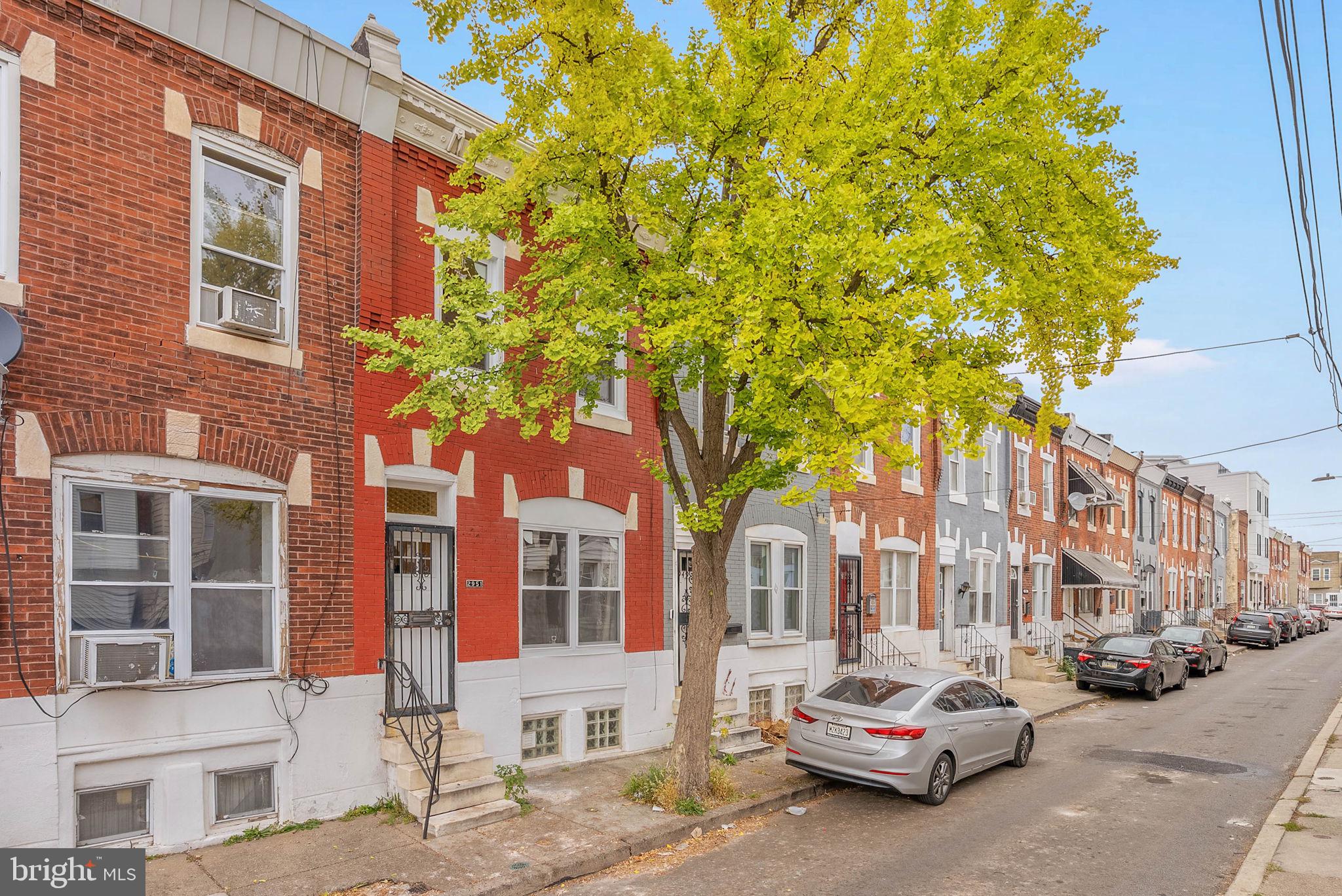2951 Gerritt Street Philadelphia, PA 19146 - Photo 2 of 21 a city street lined with buildings and cars