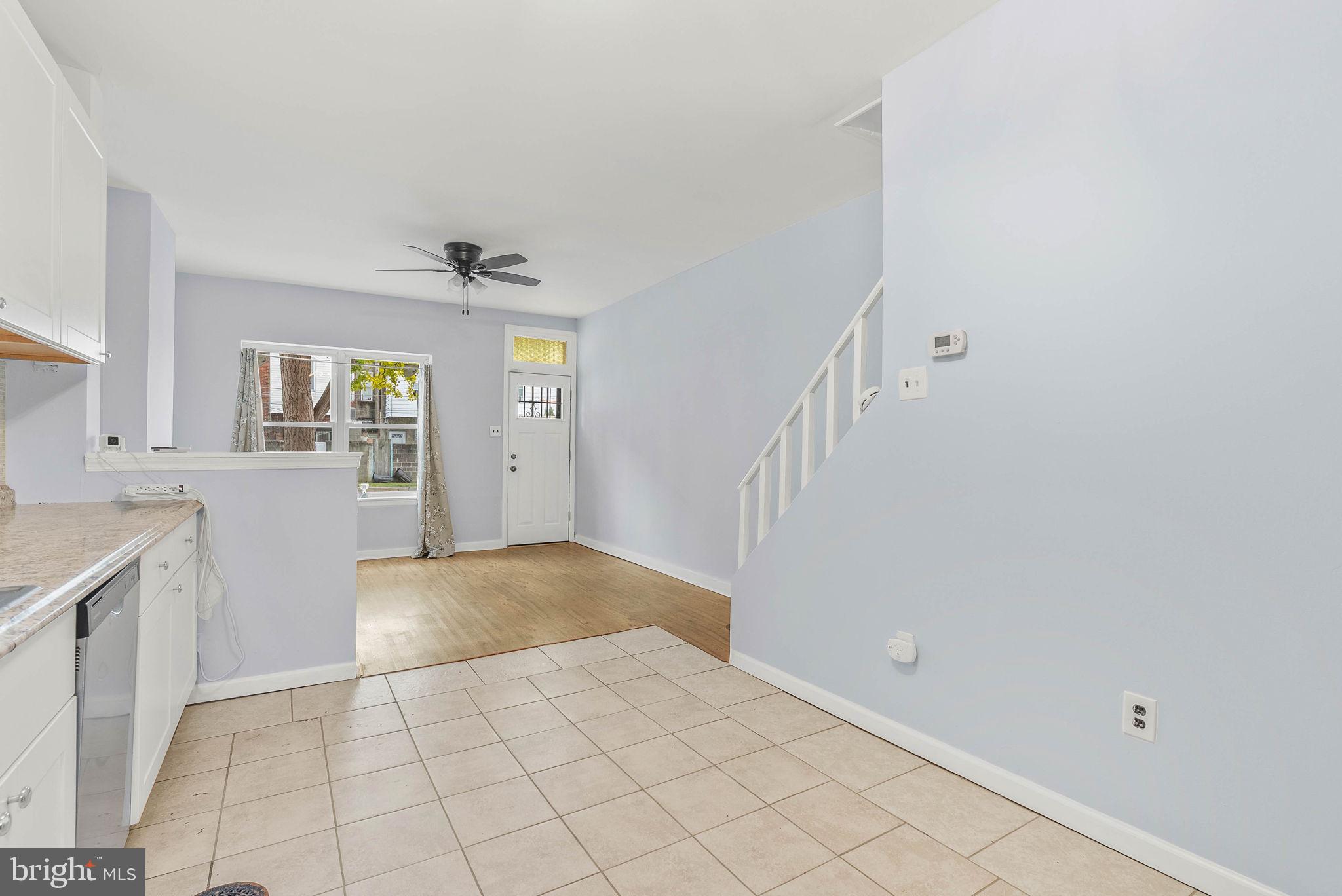 2951 Gerritt Street Philadelphia, PA 19146 - Photo 10 of 21 a view of a kitchen with a sink and dishwasher with white cabinets