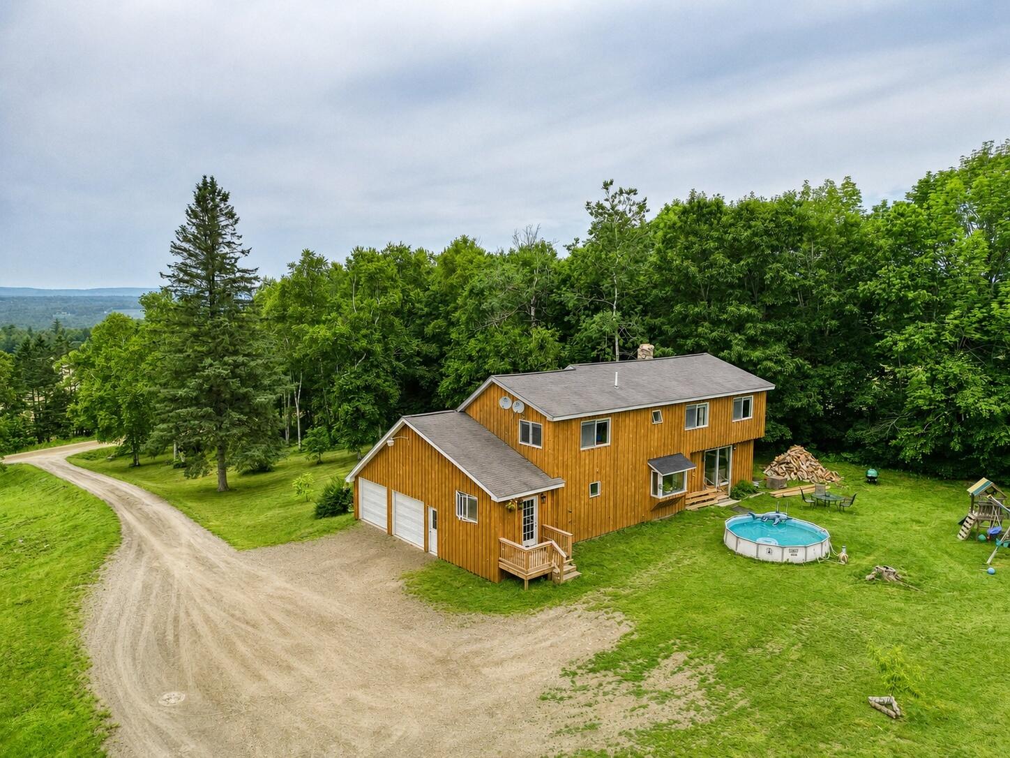 173 Tibbetts Road Exeter, ME 04435 - Photo 2 of 47 173 Tibbetts Road Exeter side aerial