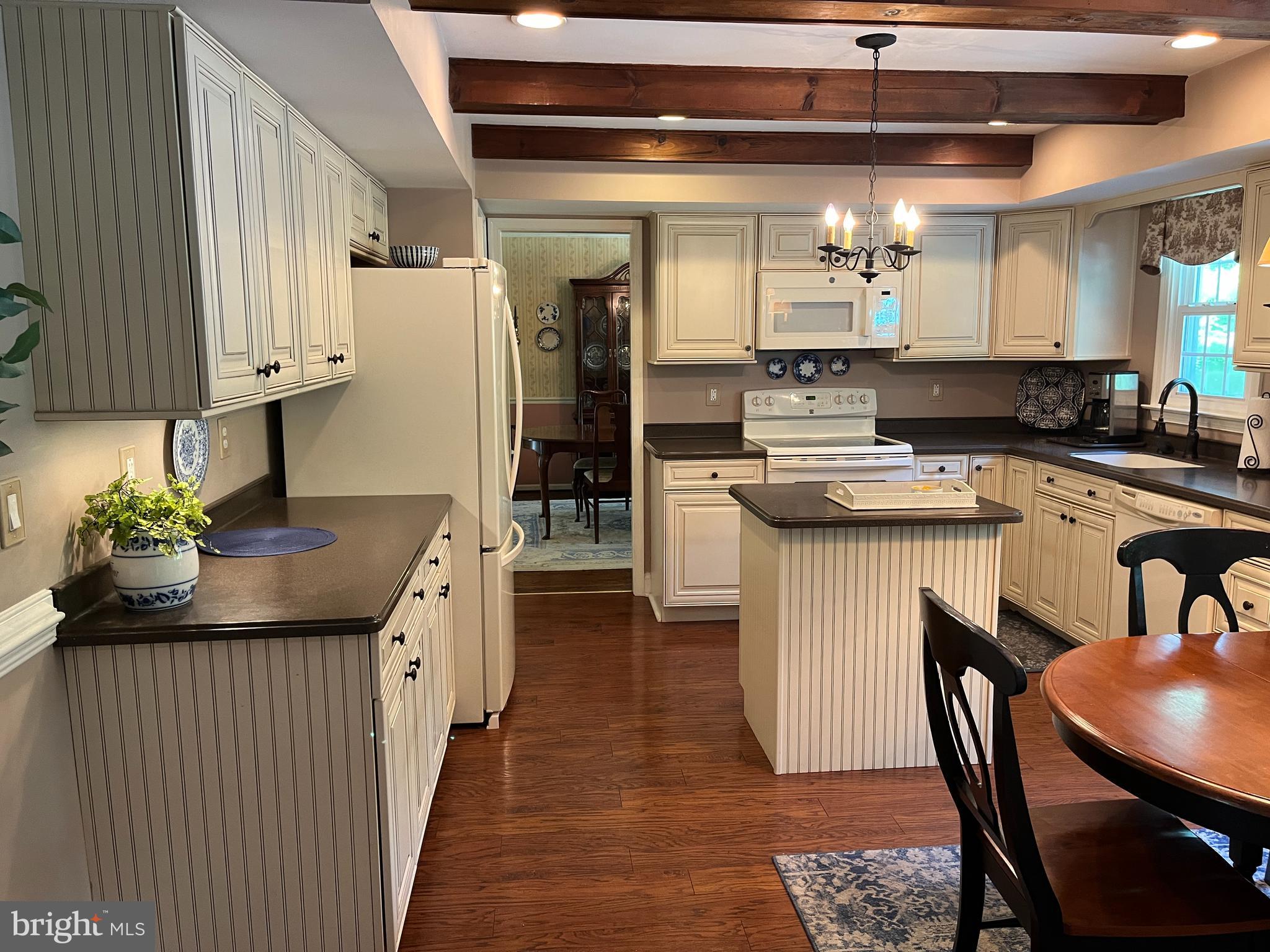 780 Hobbs Road Wayne, PA 19087 - Photo 8 of 53 a kitchen with stainless steel appliances kitchen island granite countertop a sink and cabinets