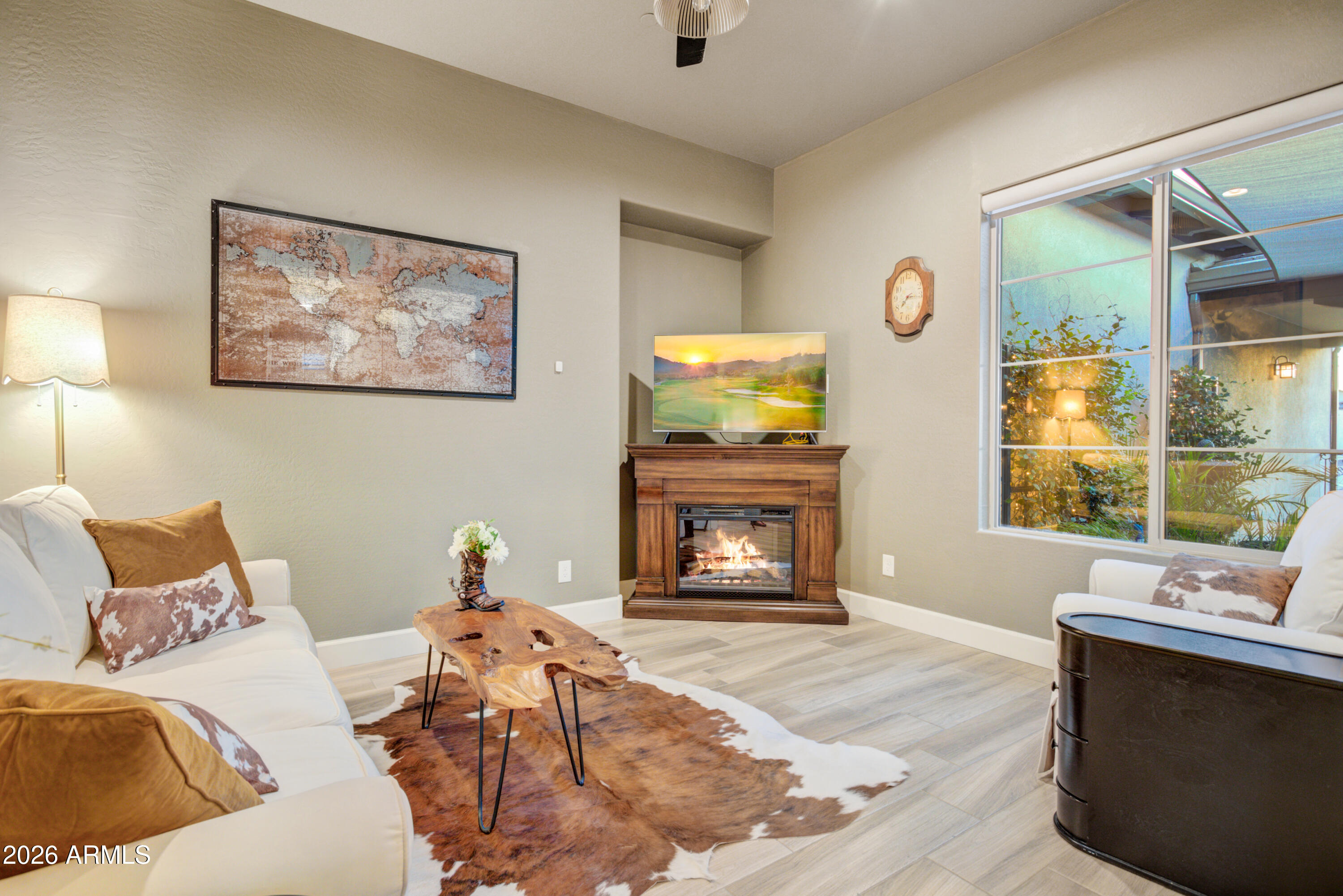 28517 North Camel Rock Court Rio Verde, AZ 85263 - Photo 15 of 39 a bedroom with a bed and a fireplace