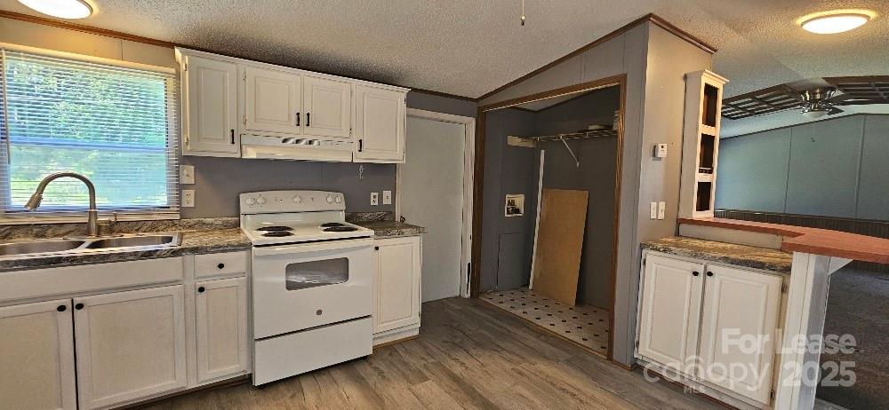 3129 Cedarvale Road Rock Hill, SC 29732 - Photo 2 of 17 a kitchen with cabinets a sink and appliances