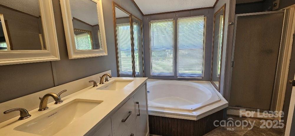 3129 Cedarvale Road Rock Hill, SC 29732 - Photo 7 of 17 a bathroom with a sink and a bathtub